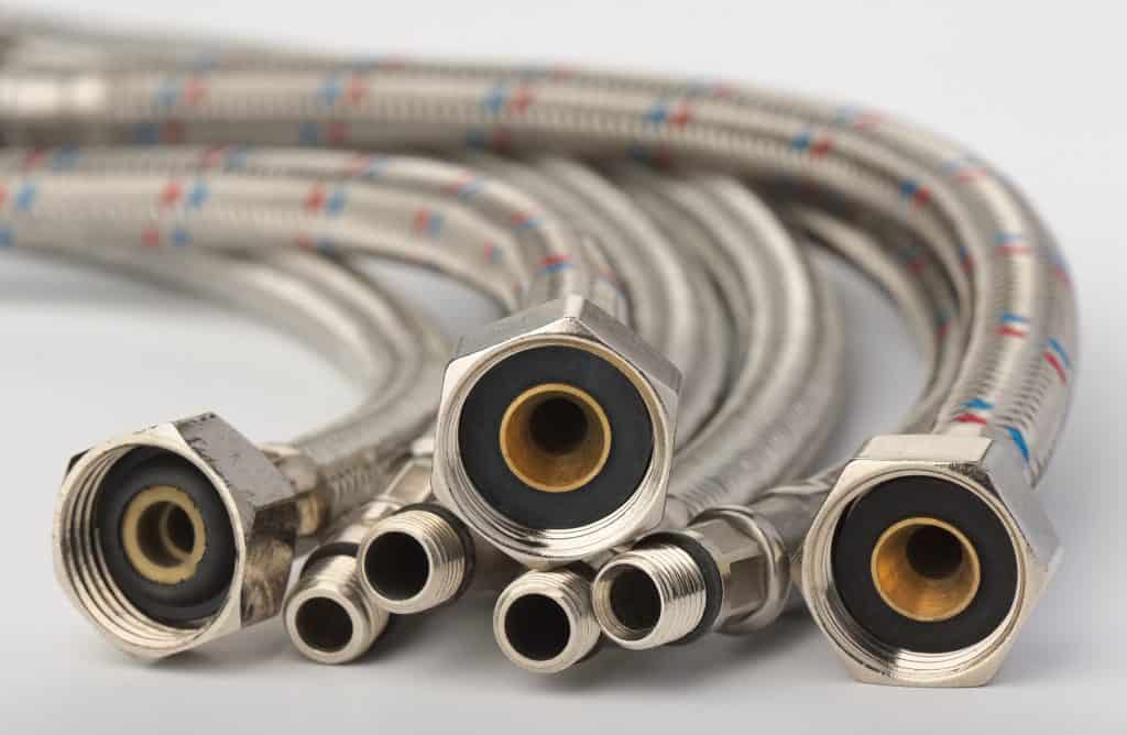 A collection of braided hoses.