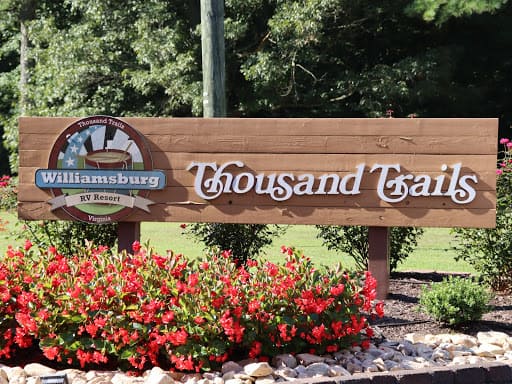Thousand Trails Williamsburg RV & Camping Resort sign at campground entrance.
