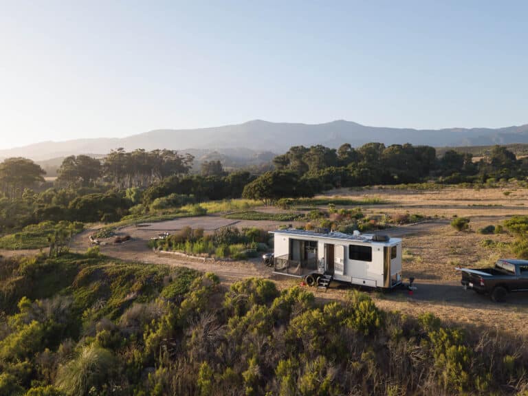 A living vehicle travel trailer in a california vineyard.