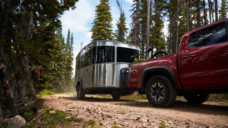 Toyota pickup tows small Airstream trailer