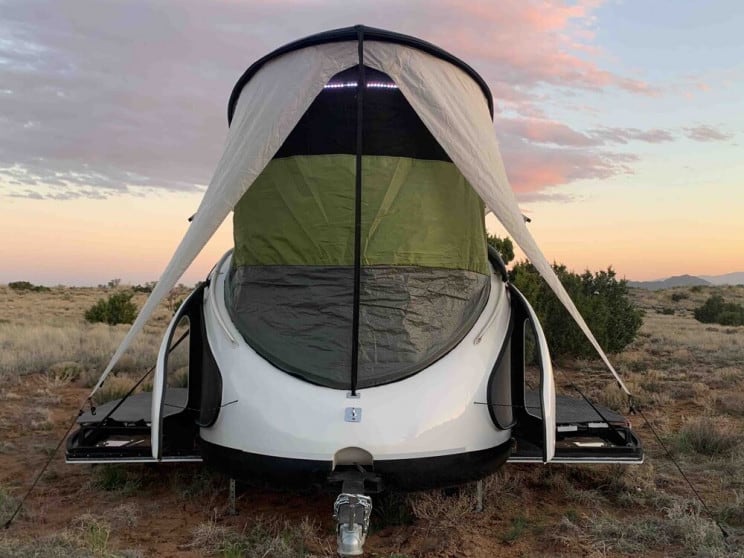 Teardrop camper fully extended to standing height.