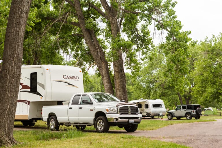RVers at campground - fifth wheel on campground road
