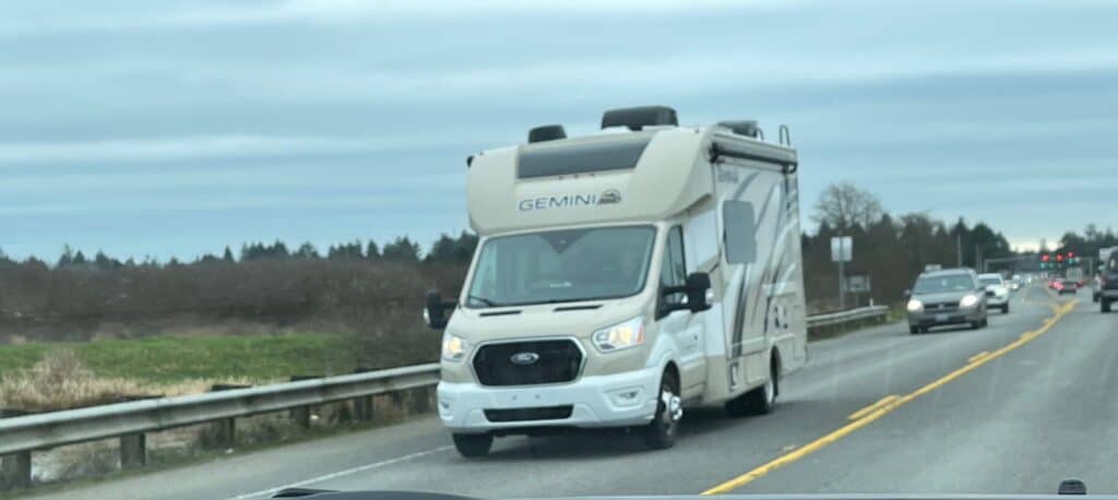 class C motorhome approaching in on coming traffic