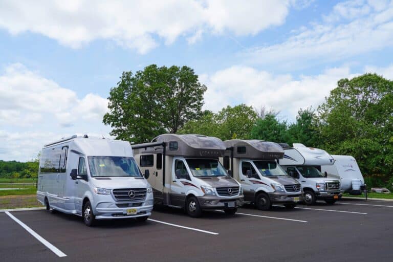 lineup of motorhomes with RV warranty