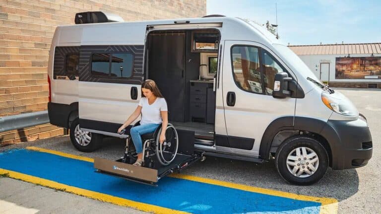 woman in wheelchair on ramp accessing the Winnebago Roam, a new wheelchair accessible RV