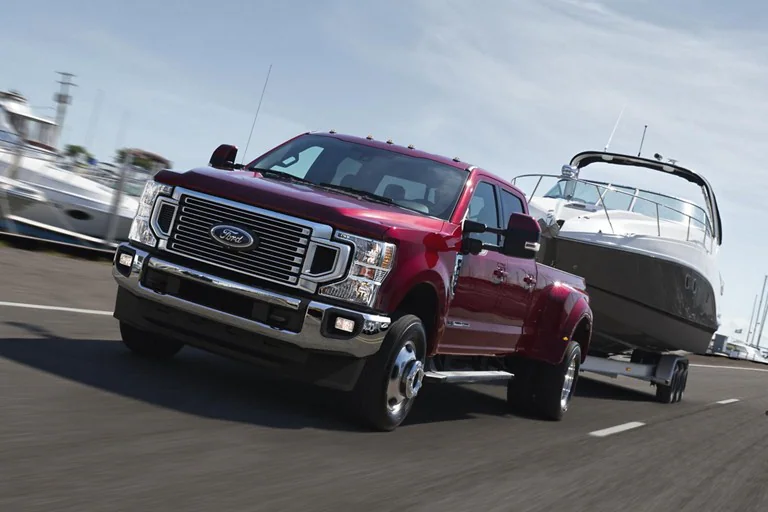 Ford truck towing a boat
