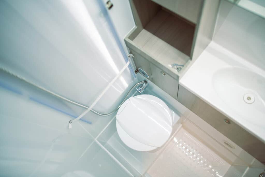 view of toilet in an RV - Feature photo for RV Wet Baths vs RV Dry Baths
