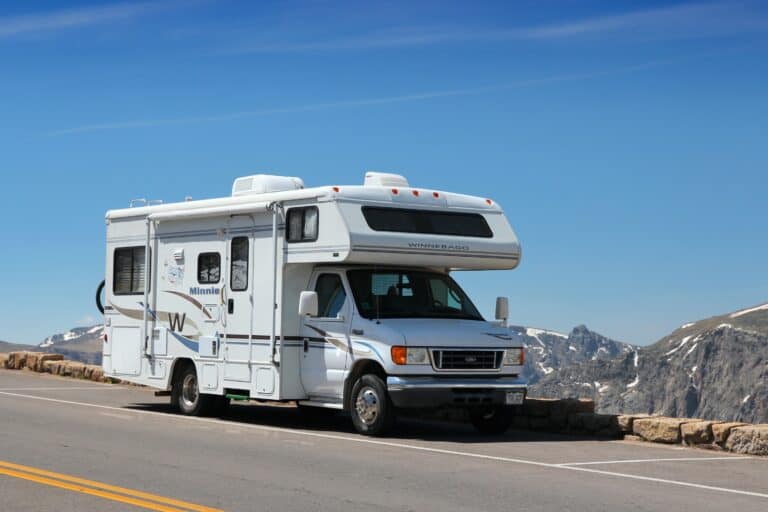 Class C RV in front of Rocky Mountains - cover photo for The Pitfalls Of Renting Out Your RV