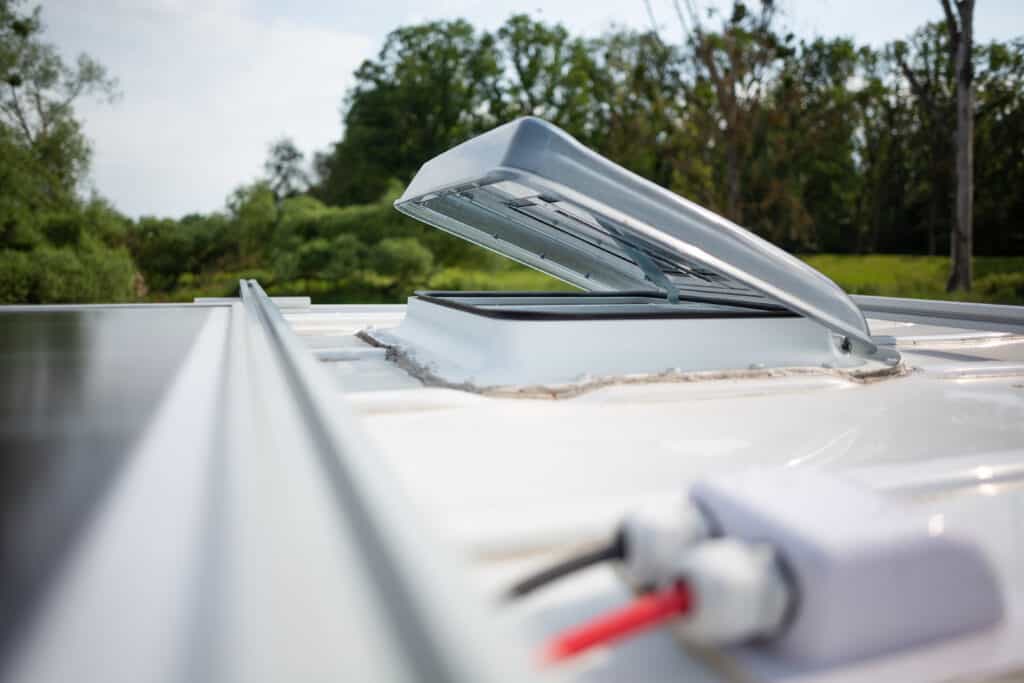RV roof sealant being applied to roof