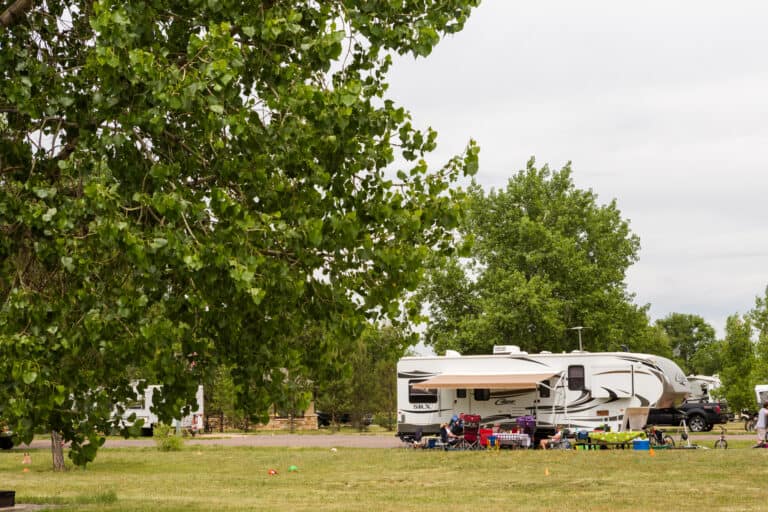 fifth wheel at campsite in Colorado - feature image for How Much Is A Fifth Wheel in 2022?