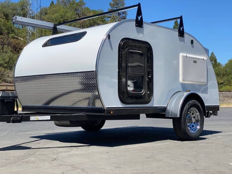 small teardrop camper with a king size bed