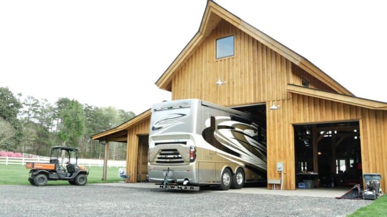 RV barndominium with motorhome sticking out front