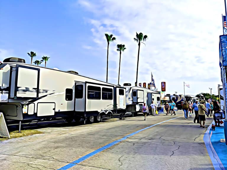 RVs for sale with buyers walking by - feature image for Will RV Prices Go Down?