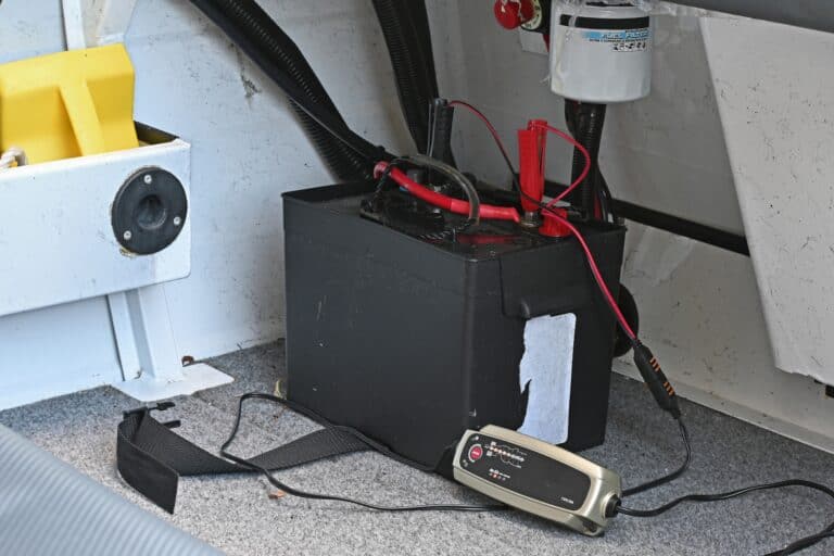 RV marine battery charger plugged in