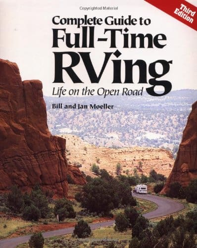 Book cover with rv being towed through the mountains - full-time RVing