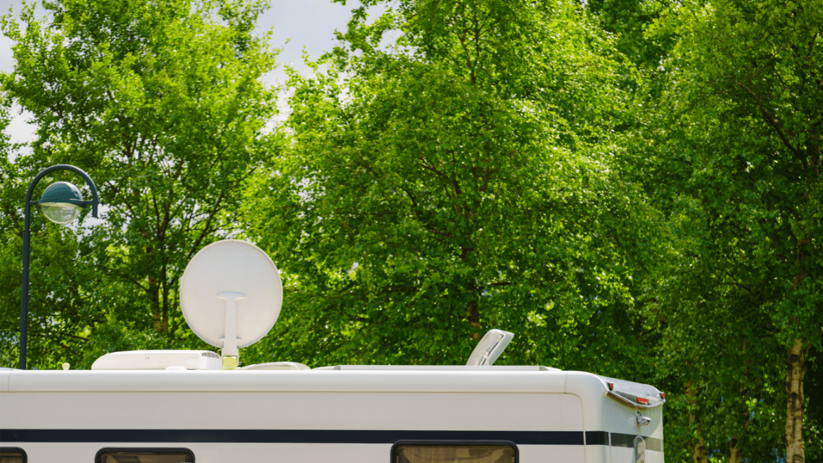 A satellite dish on top of an RV