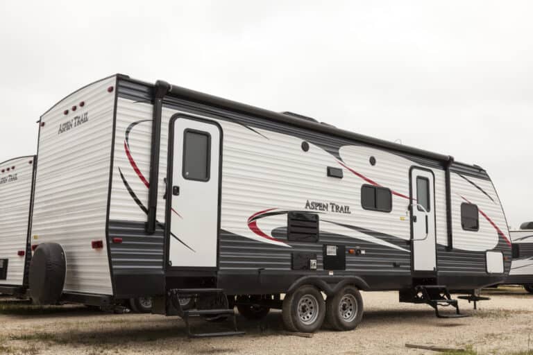 feature image for Can I Buy An RV With No Money Down? - travel trailer at dealership