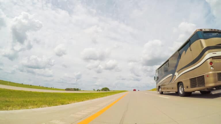 RV driving on highway - feature image for what wind speeds are dangerous for my RV
