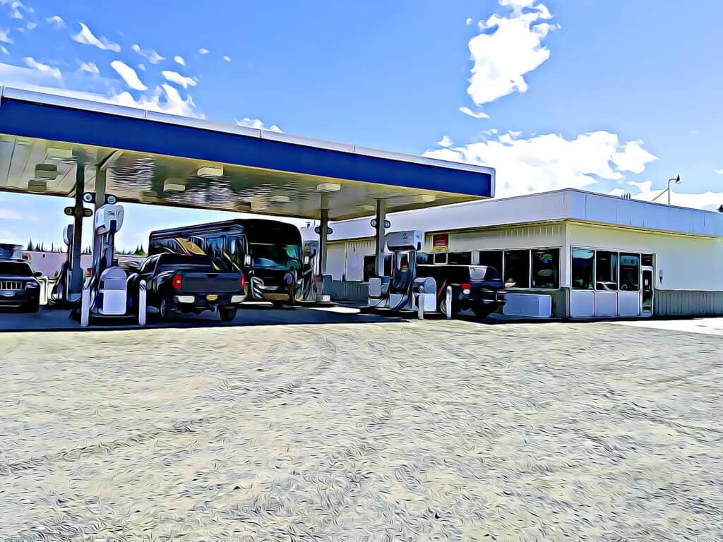 motorhome at gas station - feature image for gas rebate 