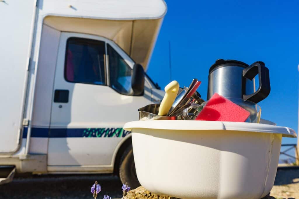 RV with biodegradable products and wash basin