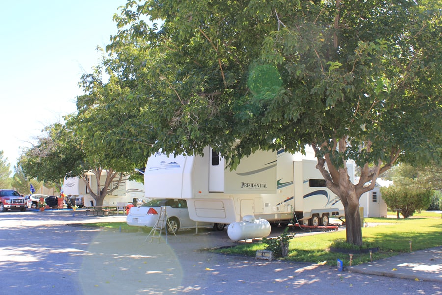 A fifth wheel parked at Sunny Acres RV Park - image for seasonal campsites