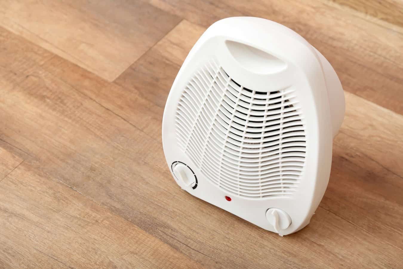 small space heater safety - heater on wood