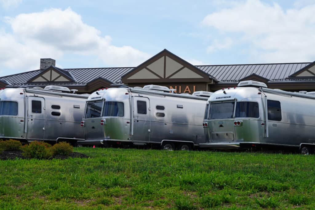 Airstream trailers at RV dealer - feature image for How Long Are RV Loans