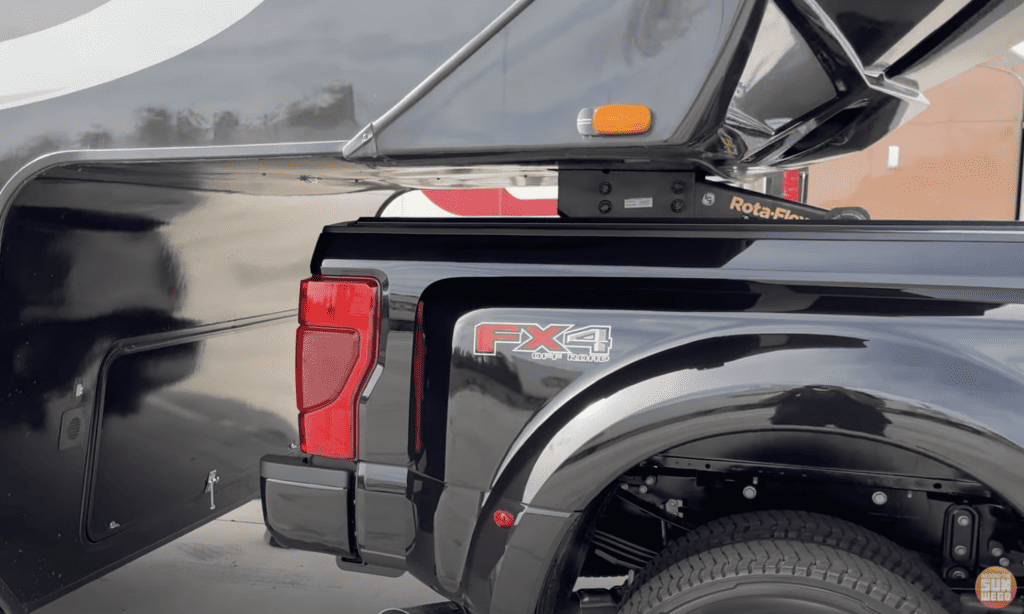 close up of ford F450 towing a 5th wheel rv