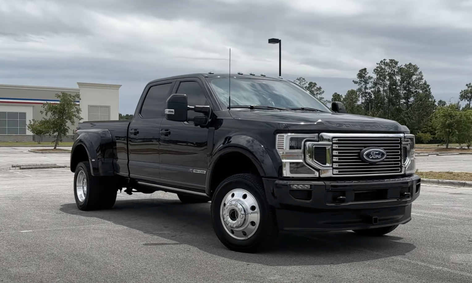 A black Ford F450 outfitted for RV towing