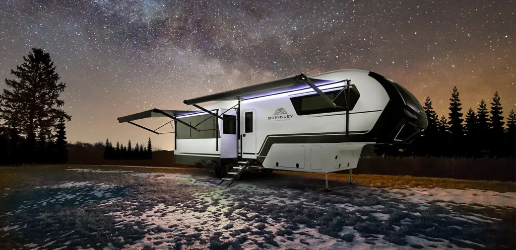 Brinkley RV fifth wheel model z 2024 at campsite under starry night sky