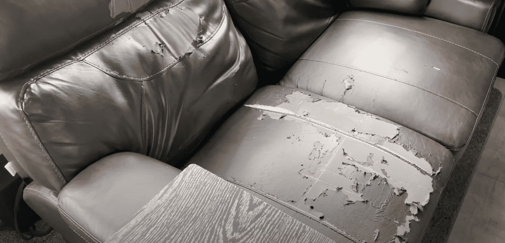 a peeling rv furniture couch with significant peeling damage.