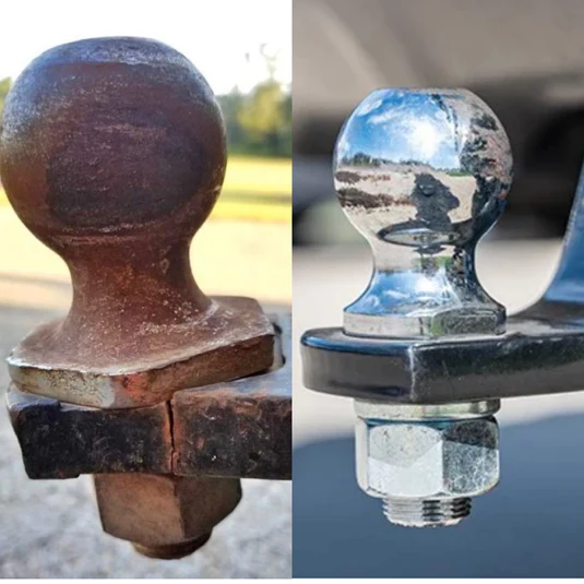 A rusted trailer hitch ball and a new trailer hitch ball that has been properly maintained when you grease your trailer hitch.