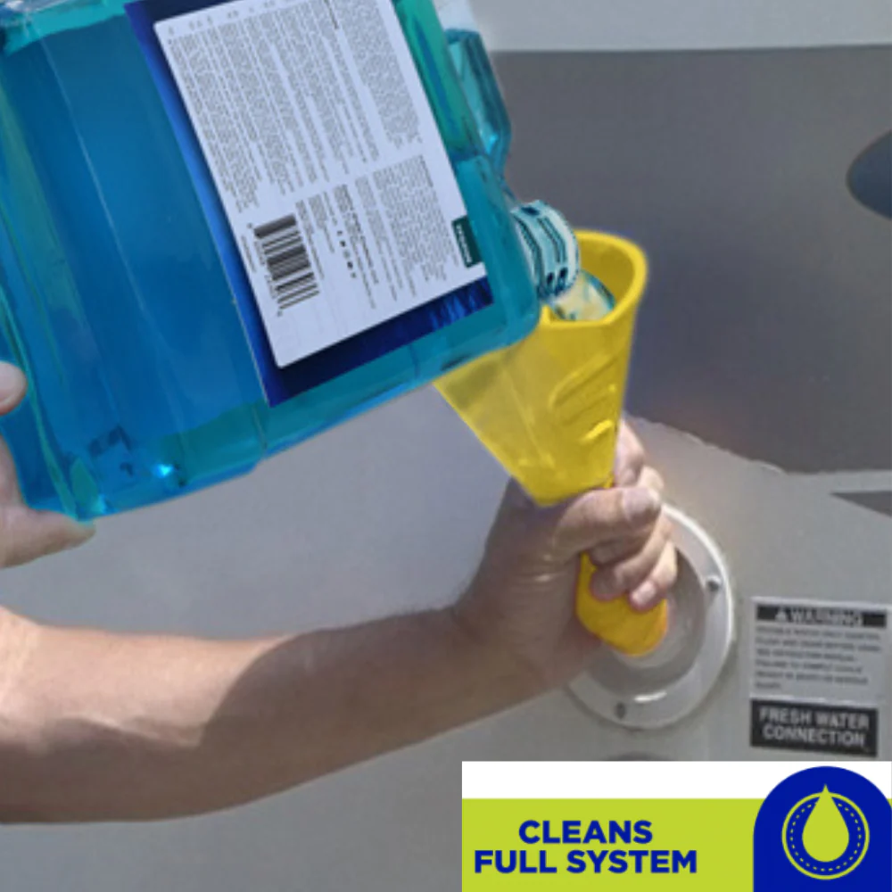 Sanitizer being poured into an RV via a funnel in order to clean and winterize the fresh water system.