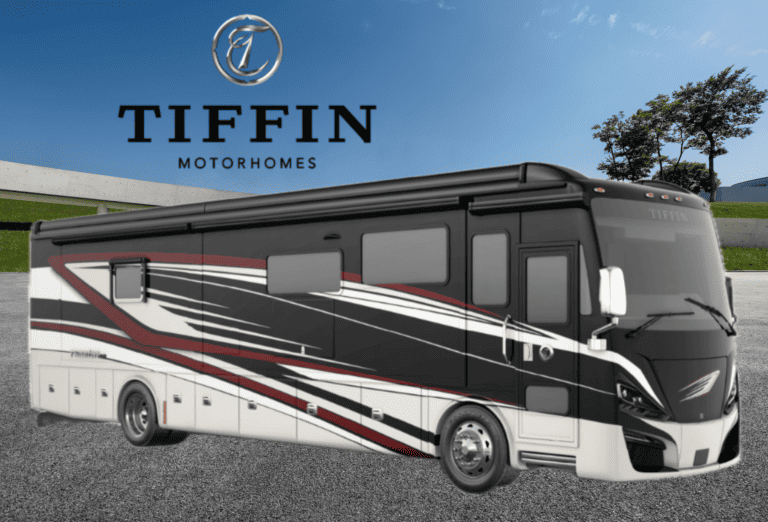 Tiffin Phaeton in parking lot with Tiffin logo above.