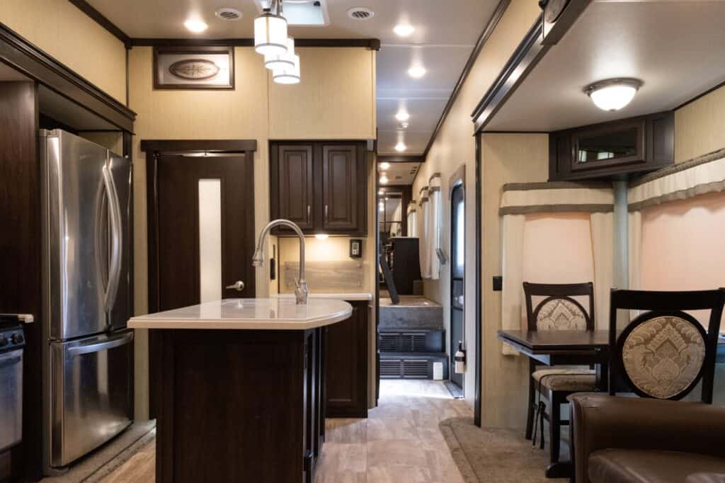 Interior and living room of a luxury fifth-wheel trailer.